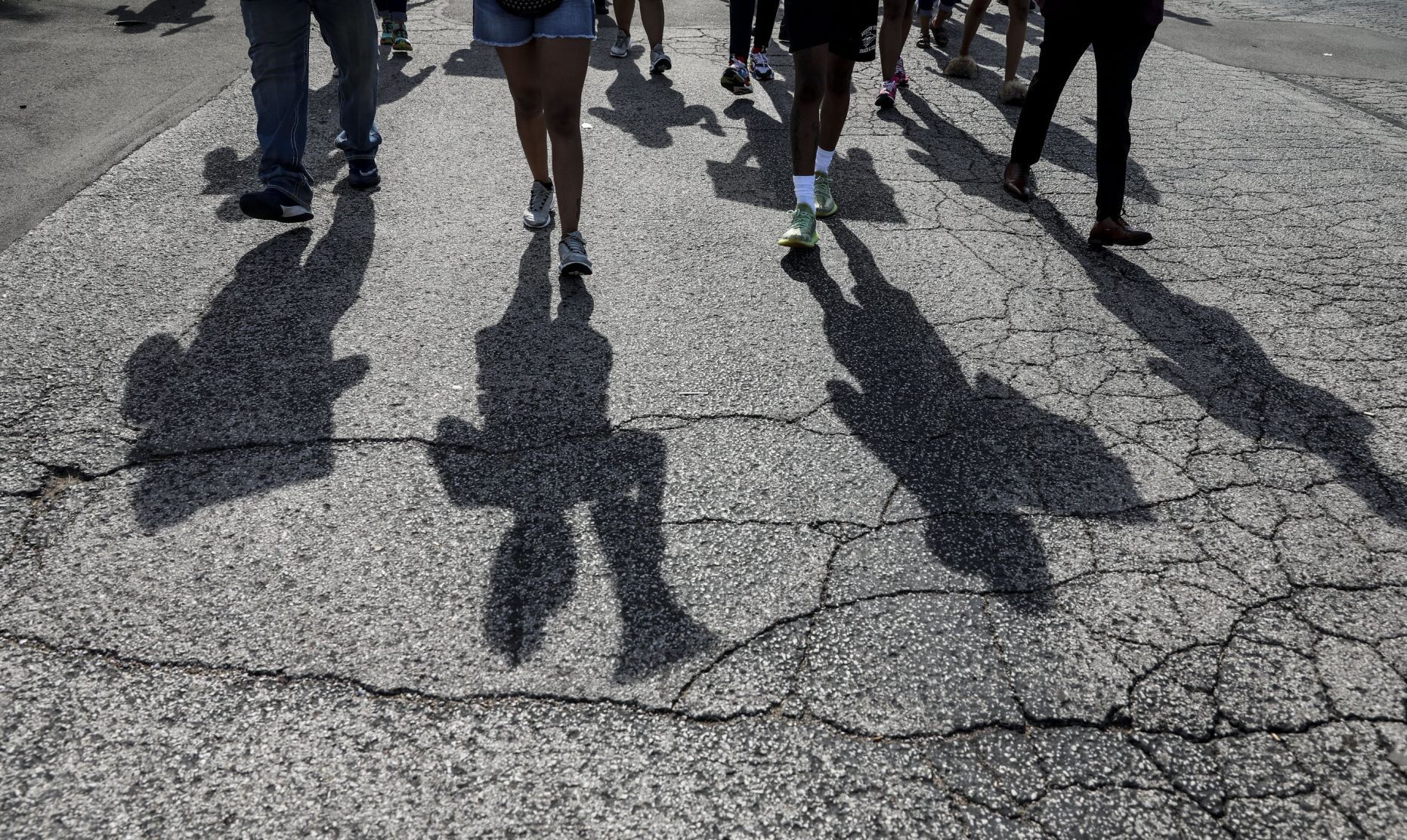 Protesters march down Highway 67